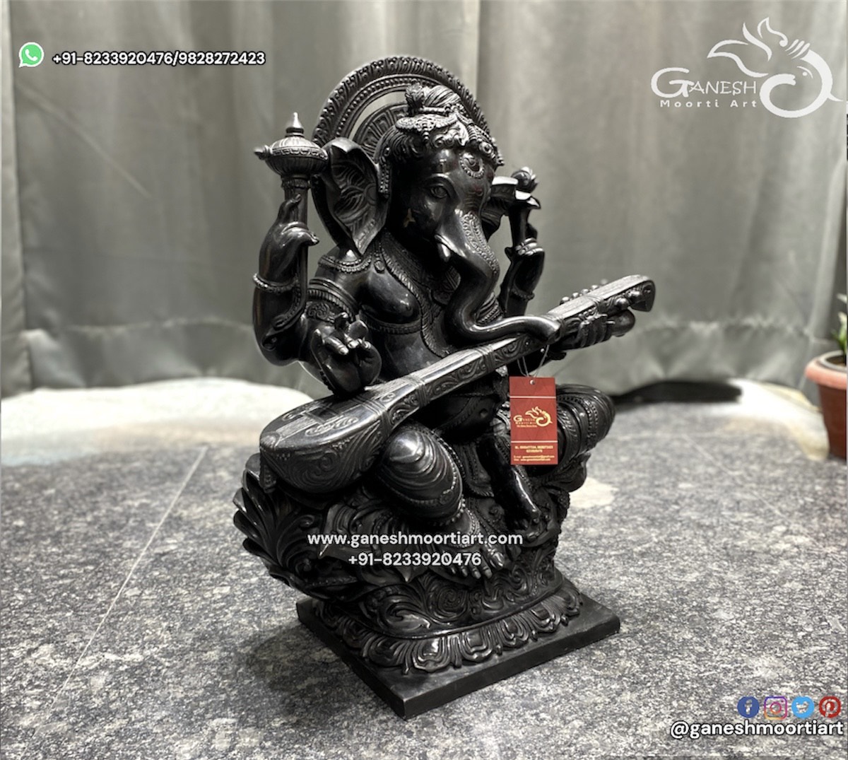 Black Ganesh Statue playing Sitar
